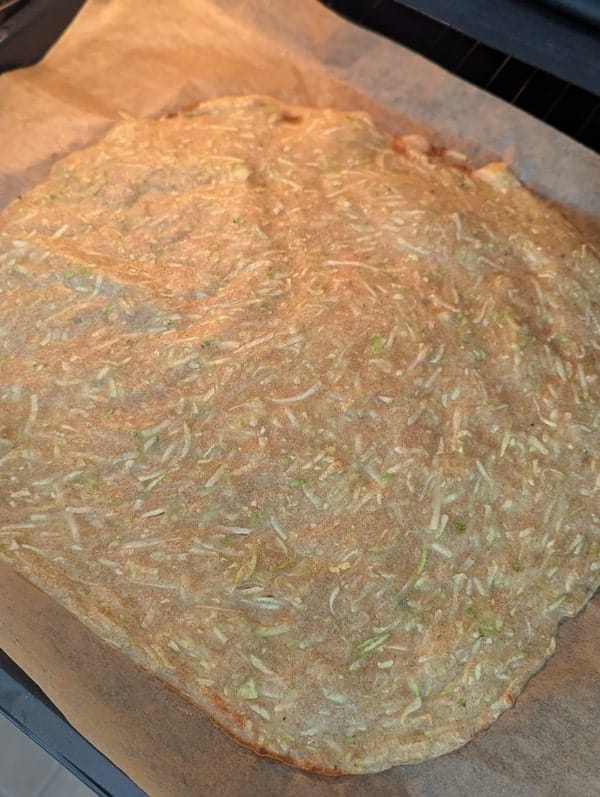 faire cuire la pate à pizza à la courgette